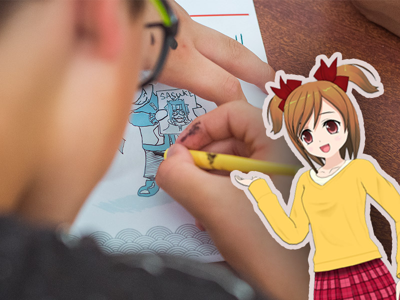 enfant apprenant à dessiner des manga en colo