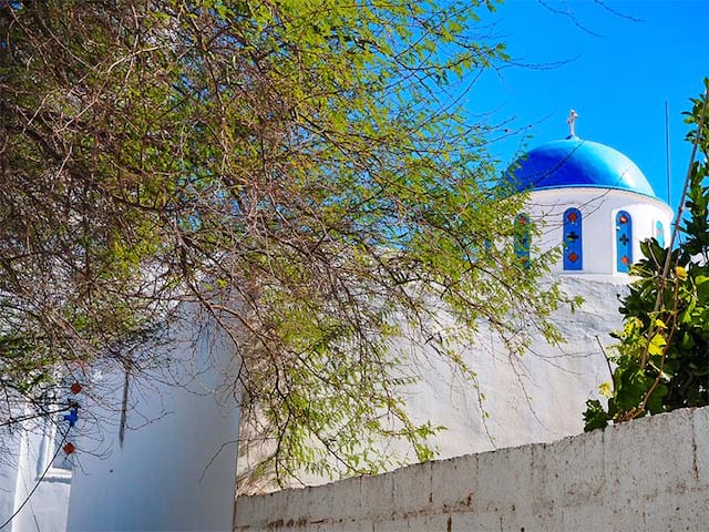 maison blanche toit bleu grèce été 