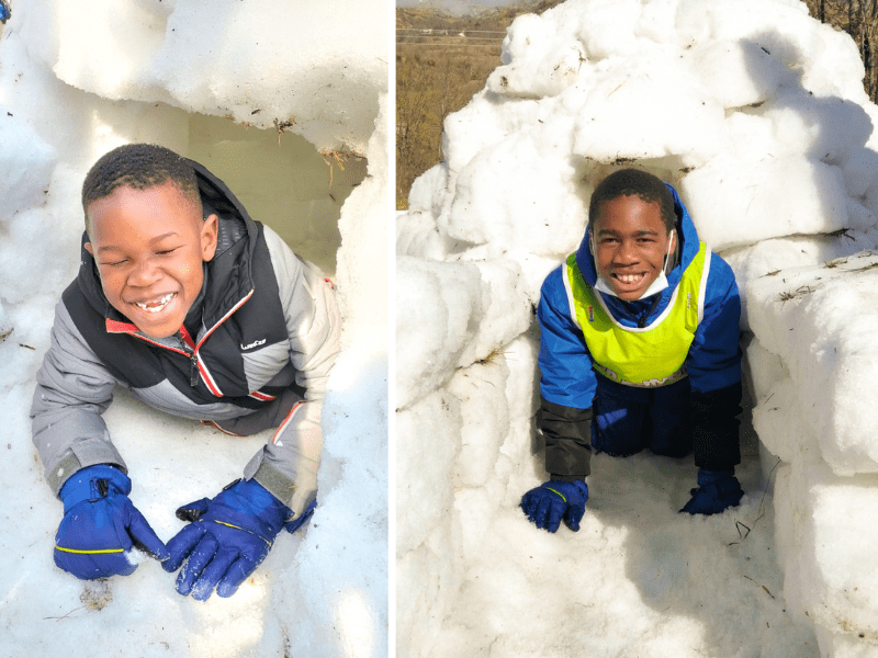 Enfants qui s'amusent après avoir construit un igloo en colo de vacances cet hiver à st jean st nicolas