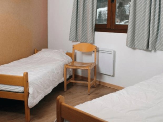 Chambre du centre de colonie de vacances le Tetras Lyre qui accueille des jeunes toute l'année
