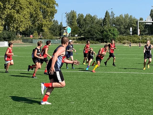 Joueurs qui pratiquent le rugby au Stade Toulousain durant l'automne 